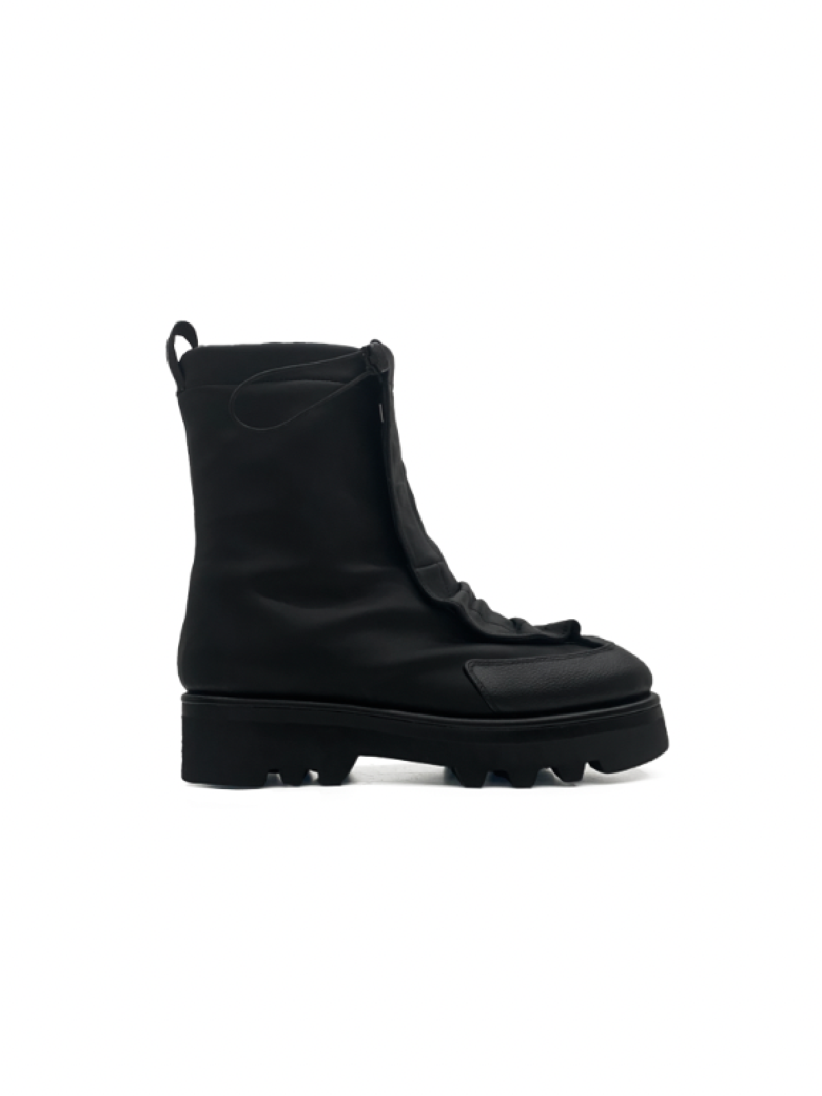 A black matte lambskin leather boot with a thick rubber sole and Velcro closure.